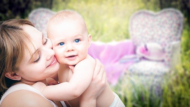 Woman with baby stock photo
